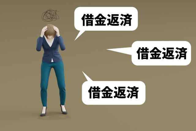 お金を手に頭を抱える。益田市で債務整理の無料相談ができます
